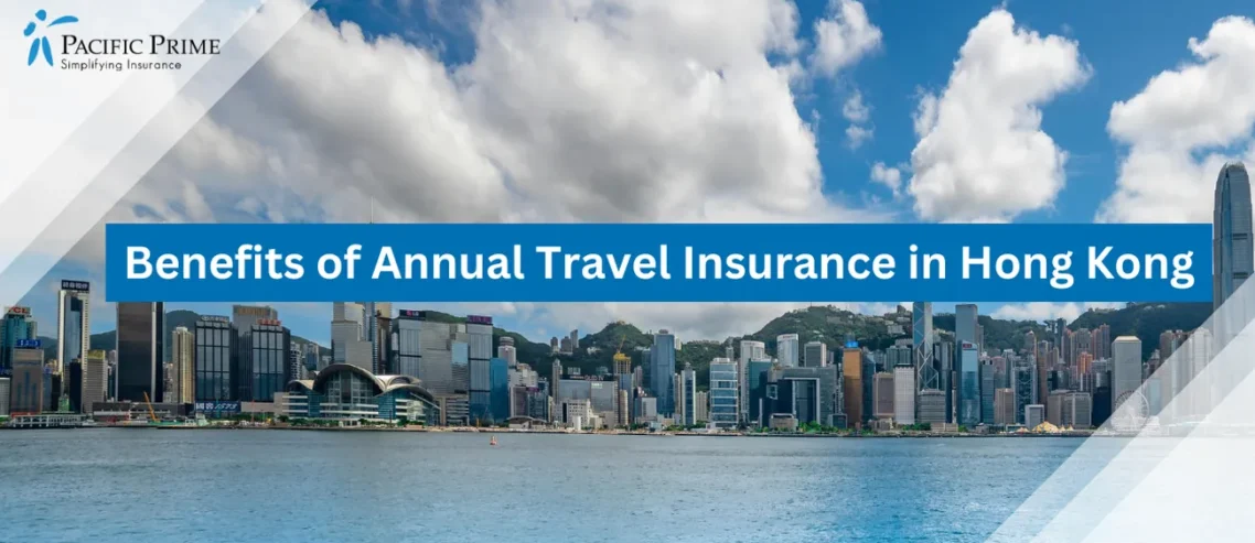 Image of Hong Kong Cityscape With Buildings By The Water Under A Bright Blue Sky And Clouds with text overlay of "Benefits of Annual Travel Insurance in Hong Kong"