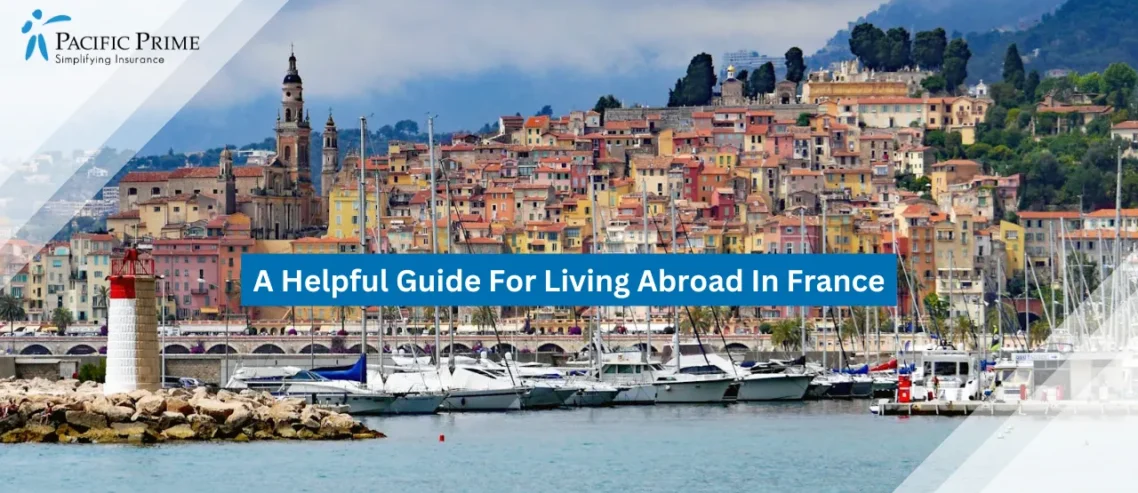Image of Houses By The Sea With Sailboats And A Lighthouse In Menton, France with text overlay of "A Helpful Guide For Living Abroad In France"